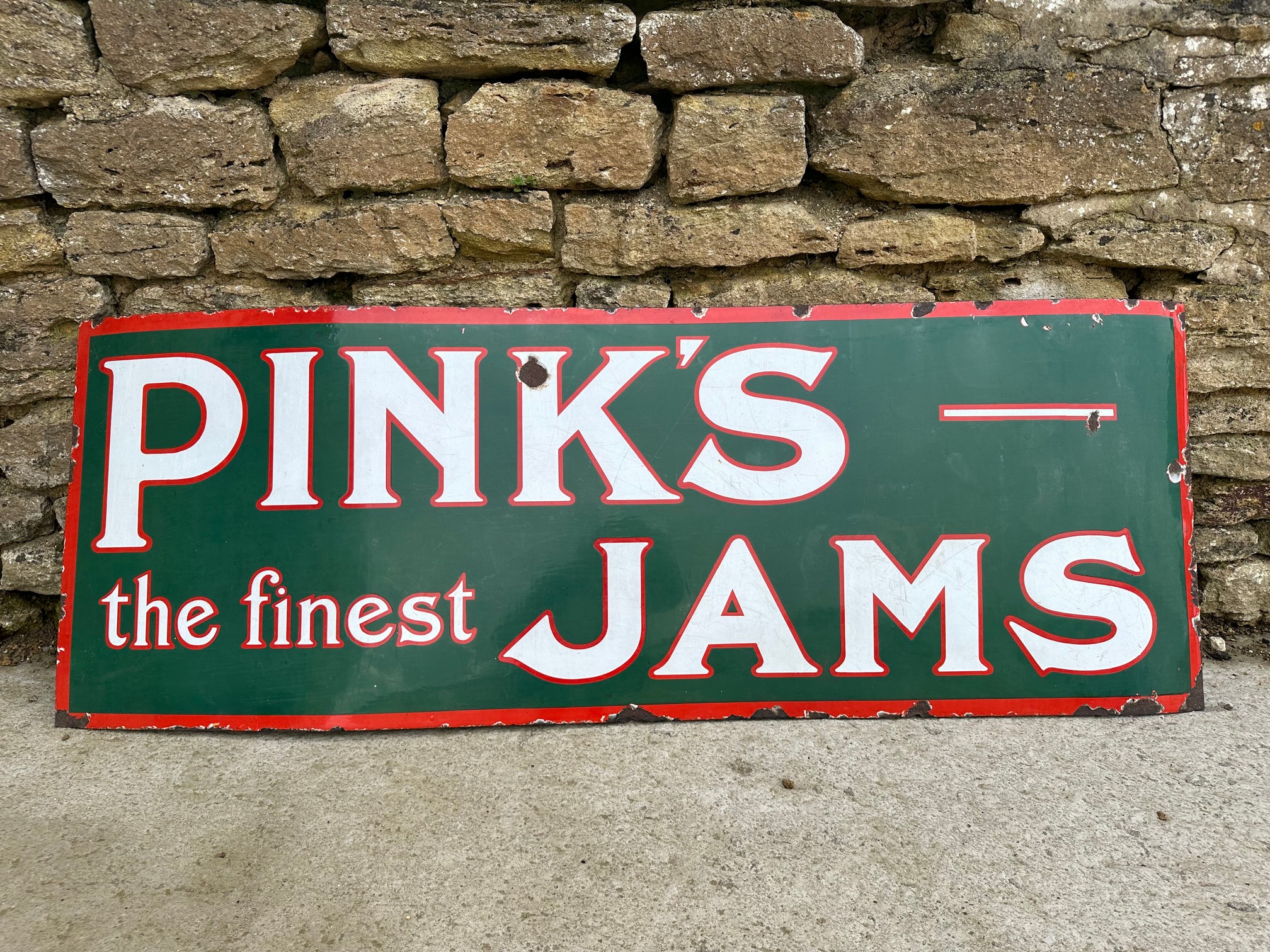 A rare and large Pink's Jams enamel advertising sign, 58 1/4 x 21".