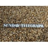 A Sunday Telegraph enamel advertising sign, 42 x 4".