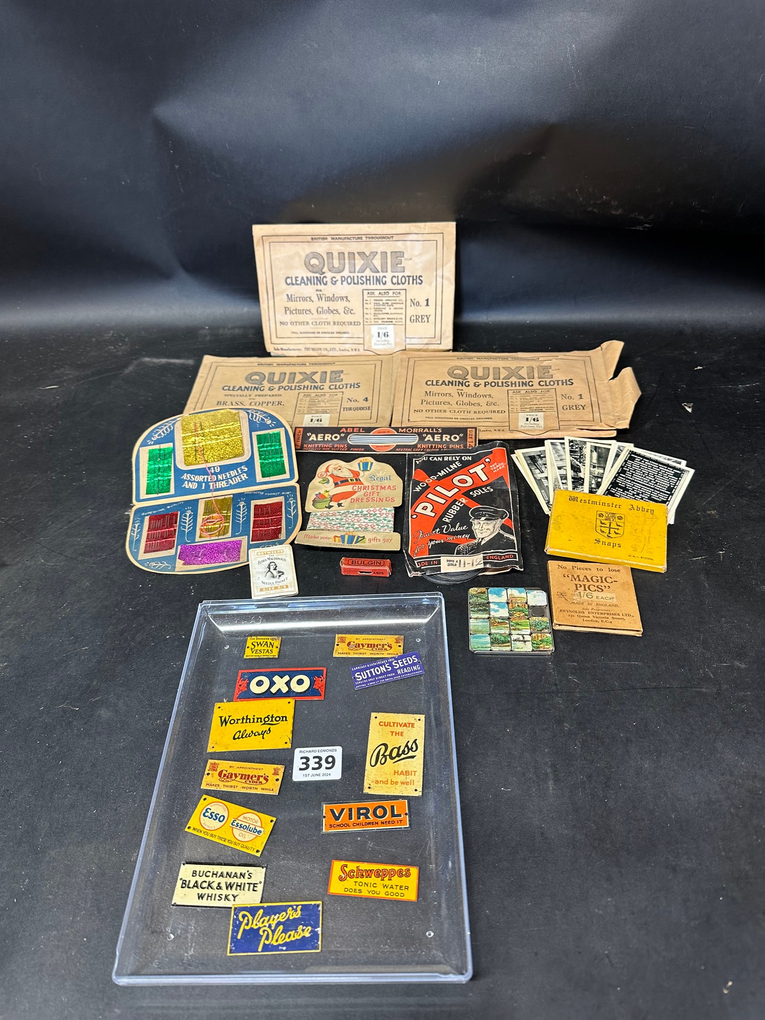 A selection of model railway scale reproductions of enamel signs, a novelty Windsor Castle game in