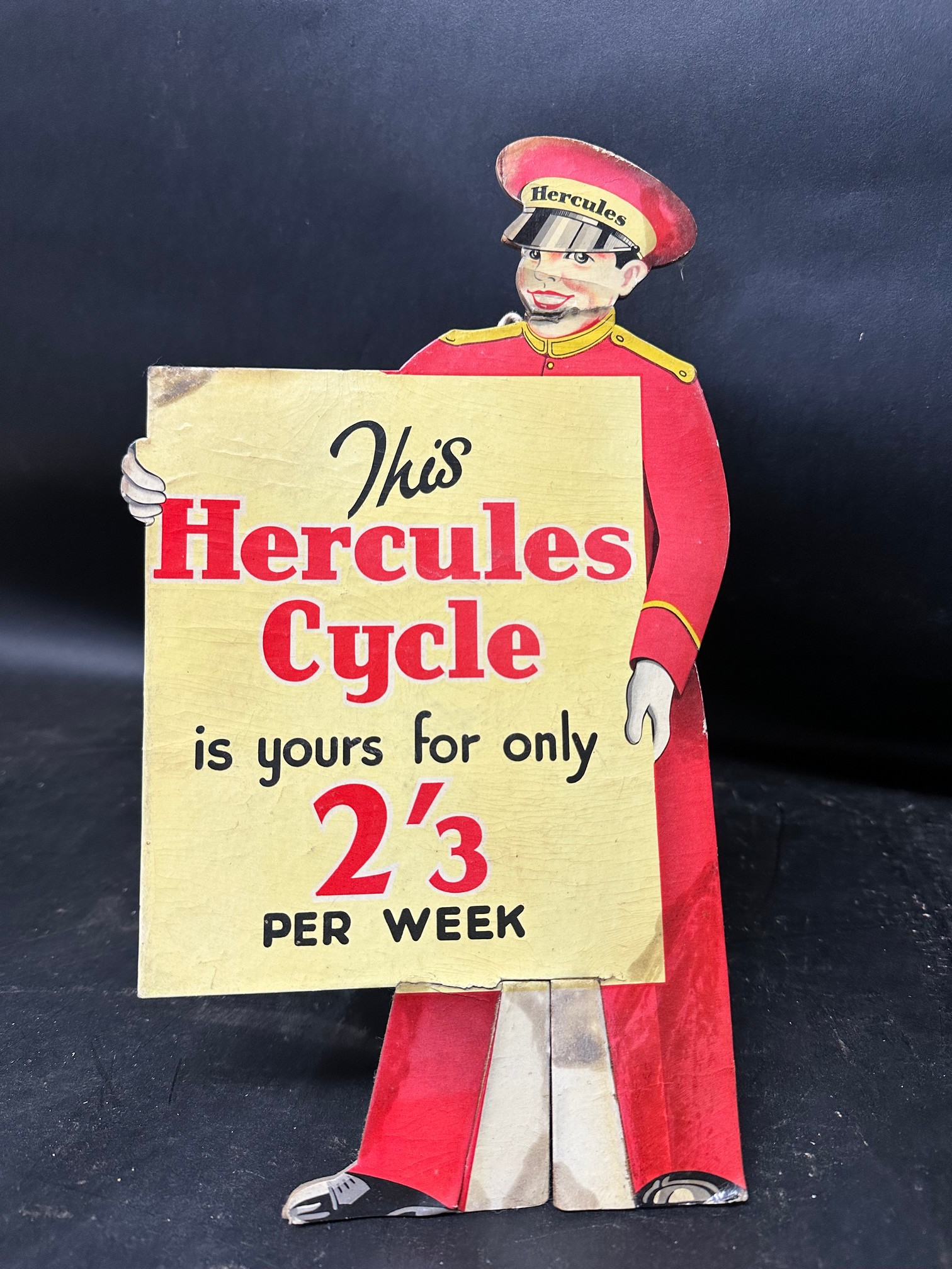 A countertop standing advertisement showcard for Hercules Cycles, 6 1/2 x 12 1/4", (optional hanging