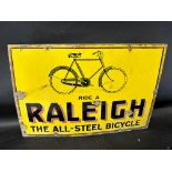 A Raleigh enamel advertising sign with illustration of bicycle, 'Ride a Raleigh the All-Steel