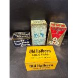 Four large tobacco counter tins: Old Holborn, Three "A" Cigarettes, Cavander's Navy Cut Magnum