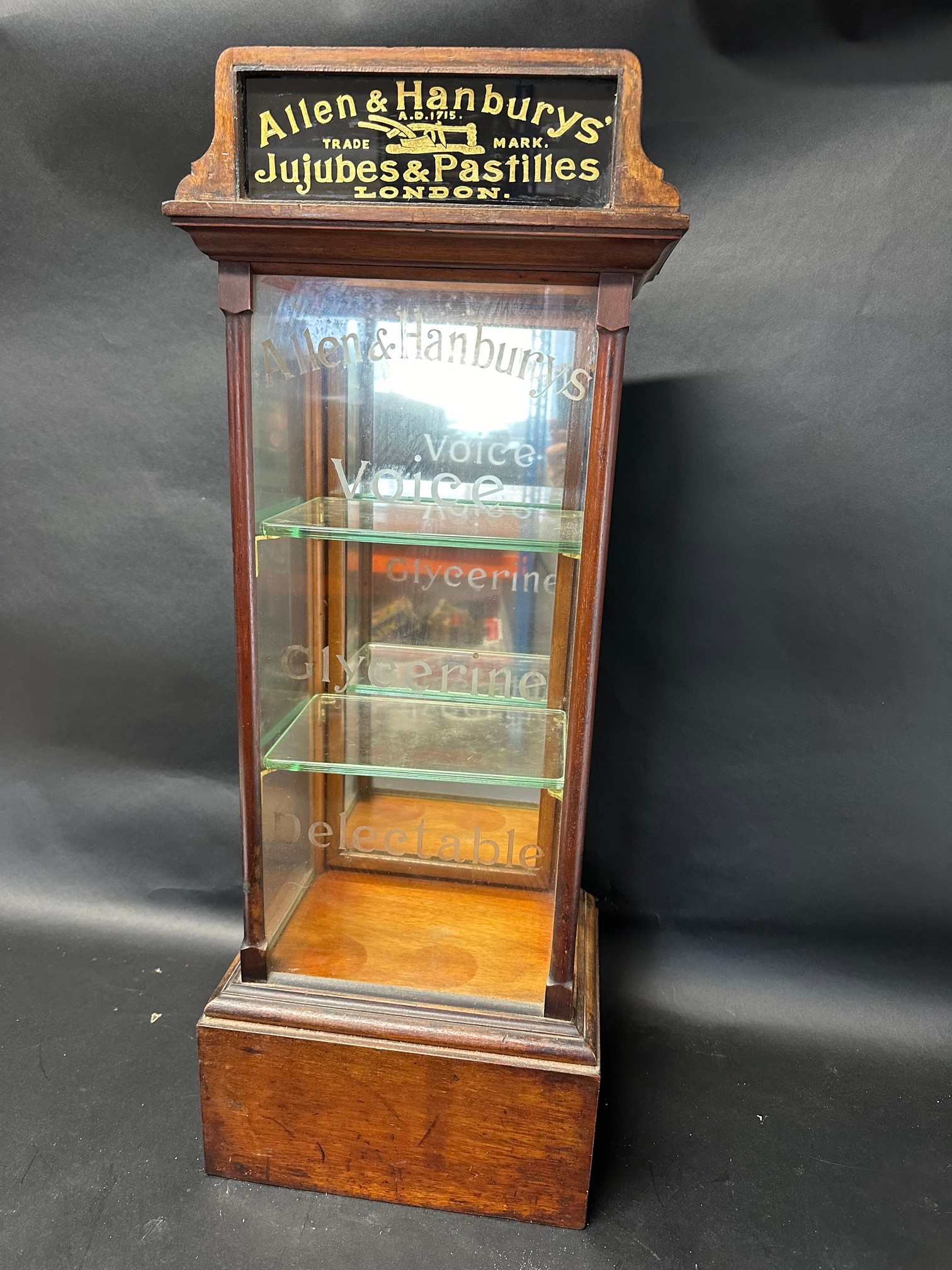 An Allen & Hanburys' Jujubes & Pastilles display cabinet with glass pediment and etched Voice,