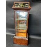 An Allen & Hanburys' Jujubes & Pastilles display cabinet with glass pediment and etched Voice,