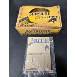 A box of Sunshine gas-filled Auto Head Lamps, new old stock and an Esso Blue invoice pad.