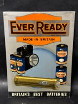 An Ever Ready 'Britains Best Batteries' tin advertising sign, with hook for hanging and stand for