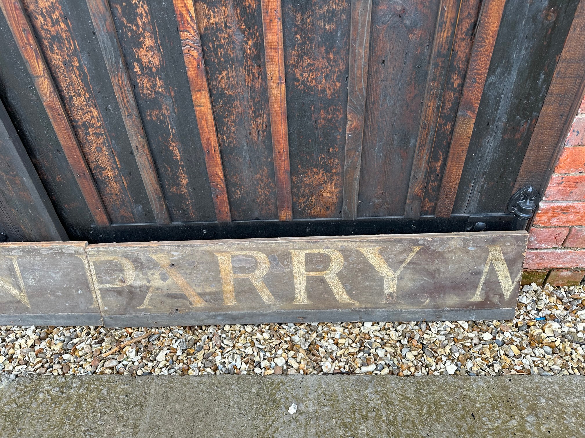Two parts of a wooden hand painted Welsh advertising sign 'Owen Parry', 48 x 10 1/2" each. - Image 3 of 3