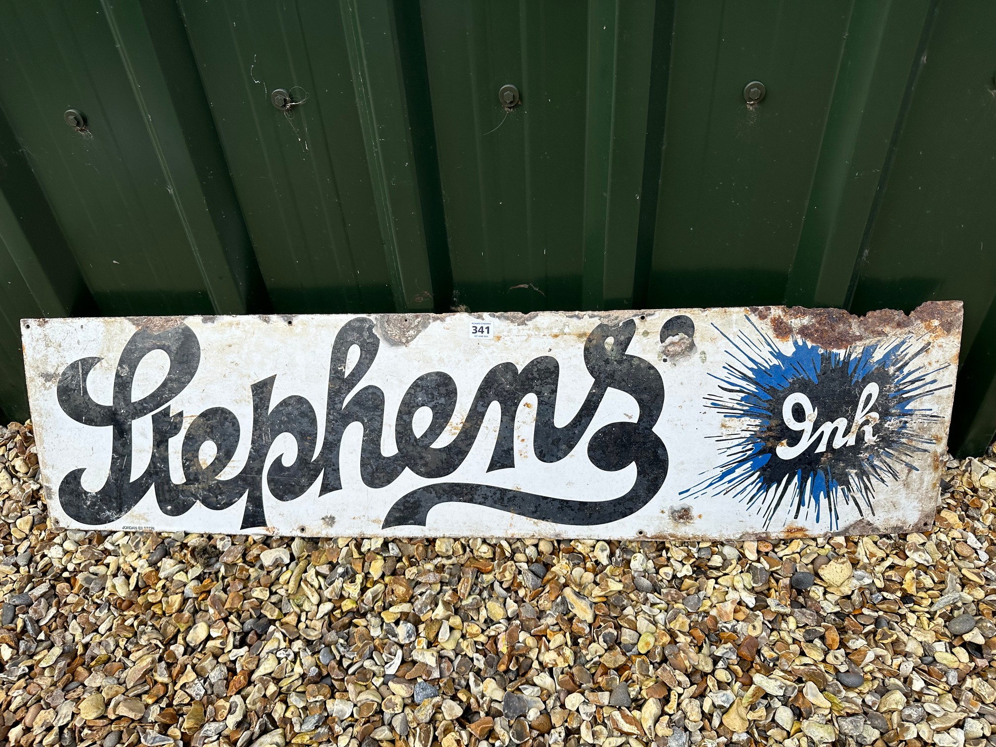 A Stephens' Ink horizontal 'splash' enamel advertising sign, 48 x 12", by repute from Basingstoke