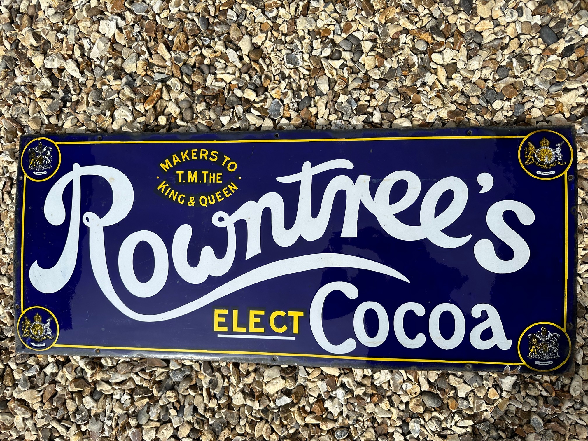 A Rowntree Elect Cocoa enamel advertising sign, 'Makers to T.M. The King & Queen, 36 x 15".