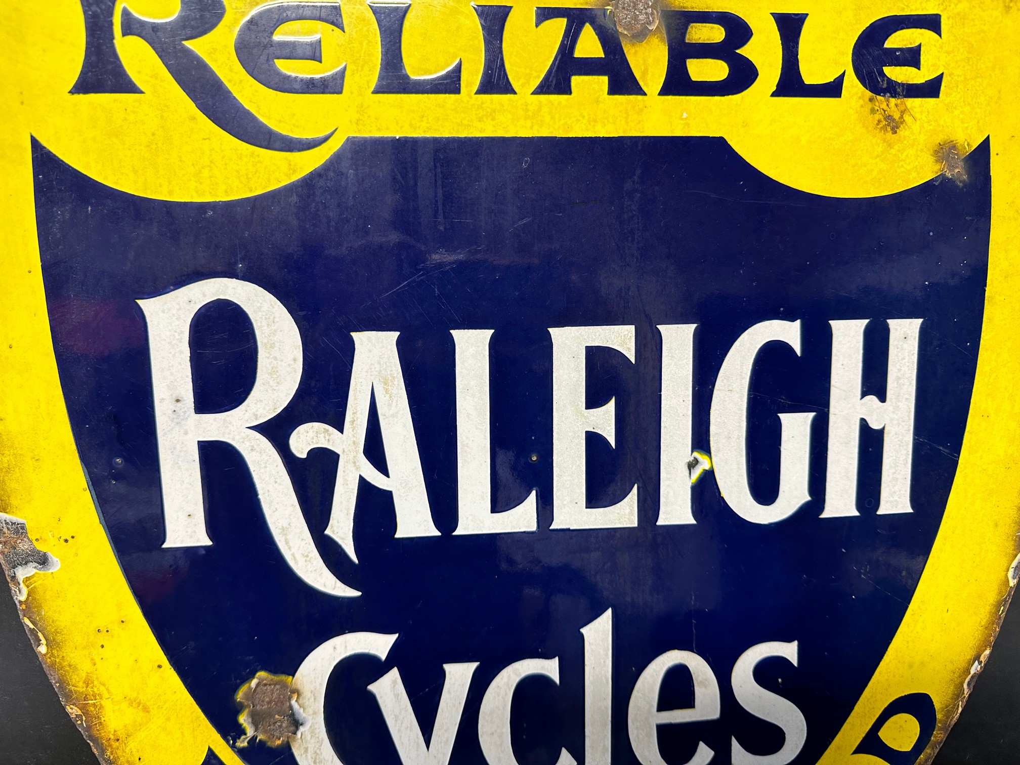 A Raleigh Cycles - Reliable, Rigid Rapid shield-shaped double sided enamel advertising sign, 17 3/ - Image 4 of 6