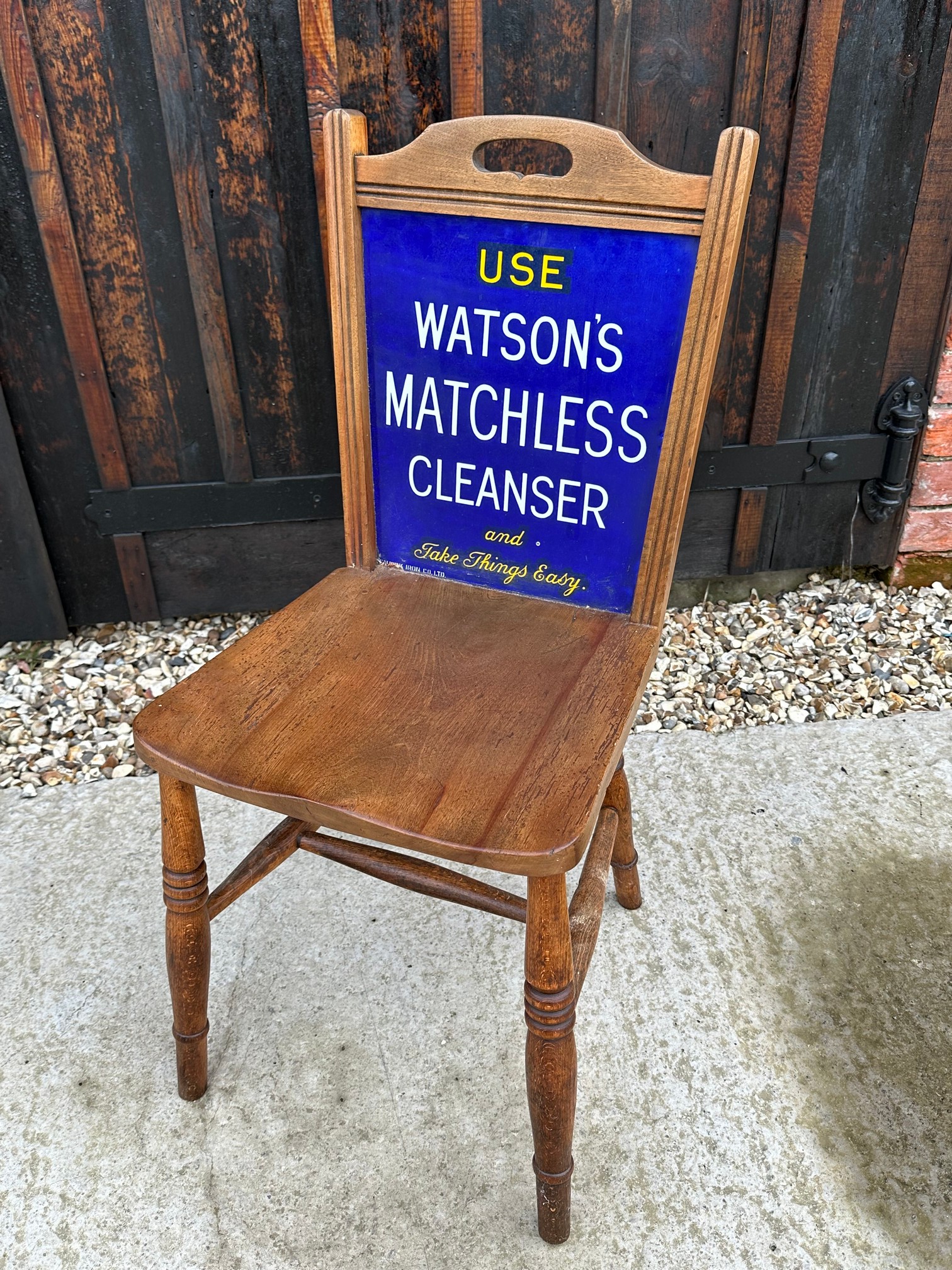 A Watson's Matchless Cleanser enamelled back advertising chair by Falkirk Iron Co. Ltd with