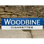 A Woodbine Cigarettes enamel advertising sign, 60 x 17 1/4".