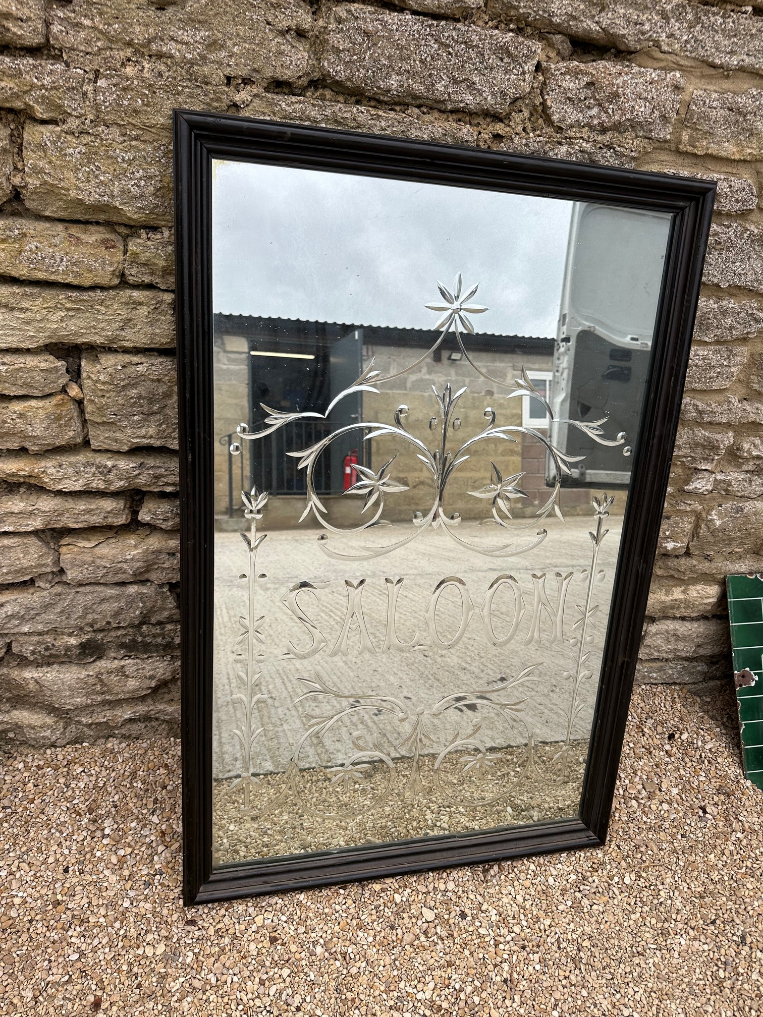 A good large pub mirror etched 'Saloon', 29 3/4 x 45".