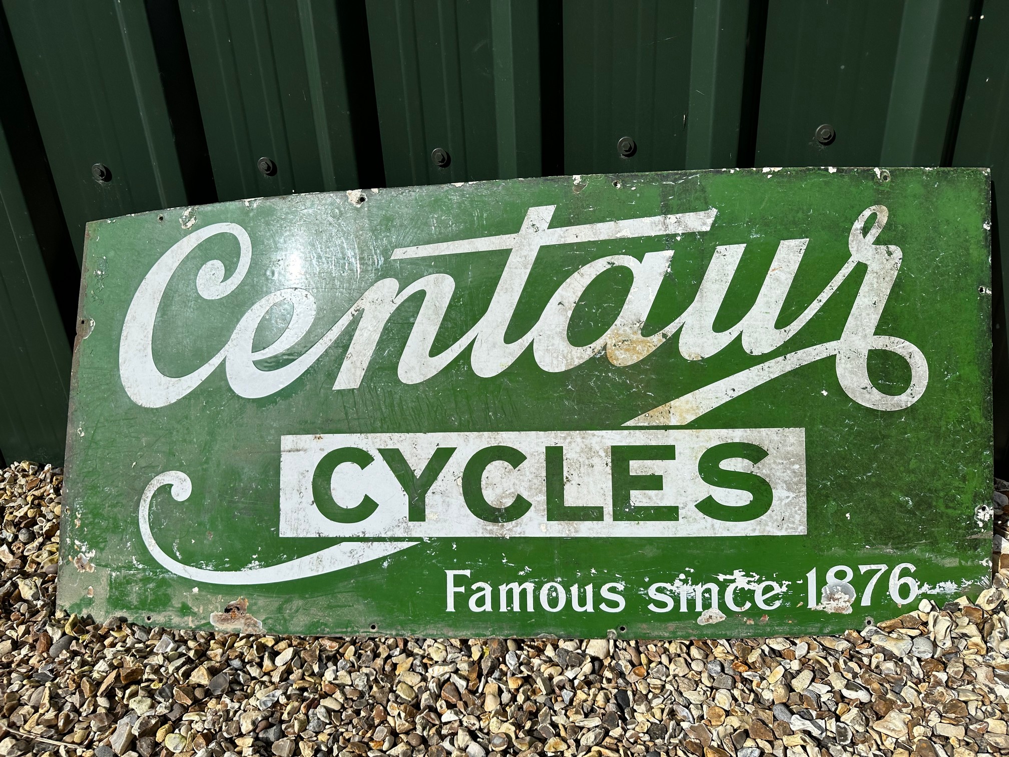 A Centaur Cycles enamel advertising sign, 50 1/4 x 23".