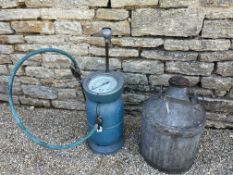 A Dunlop forecourt tyre pressure pump and a Regent Oil container with handle.