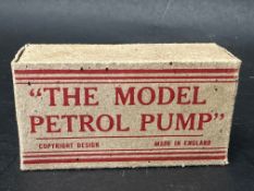 A wooden and metal model petrol pump, box measures 3 1/2 x 2 x 1/2