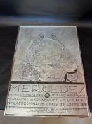 A framed and glazed Mercedes poster depicting a couple in Art Deco dress against a Mercedes car,