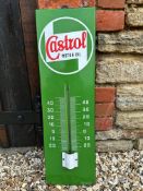 A Castrol Motor Oil enamel garage wall thermometer, 9 x 32 1/4