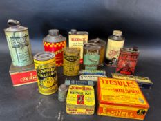 A collection of motoring tins including cycle repair outfits, Shell, Carburol, Romac, John Bull,