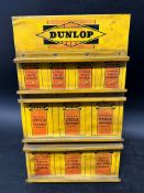 A Dunlop countertop point of sale tin stand for cycle valve rubbers, Reddifix Cycle Patches and