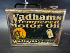 An early Wadhams Tempered Motor Oil rectangular oil can containing 1/2 US gallon.