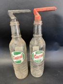 Two Castrol glass quart oil bottles.