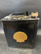 A Shell two gallon can with gold transfer to each side, Shell cap, Valor 8'37.