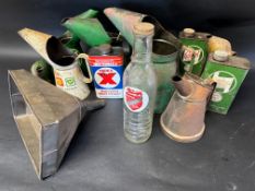 A Royal Snowdrift Oil glass quart oil bottle, a selection of pourers, a large funnel and three motor