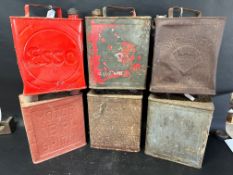 Six two gallon cans: Esso, BP Motor Spirit, Shell Motor Spirit, Shell-Mex, Shell Motor Spirit and