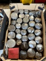 A box of mixed pistons.