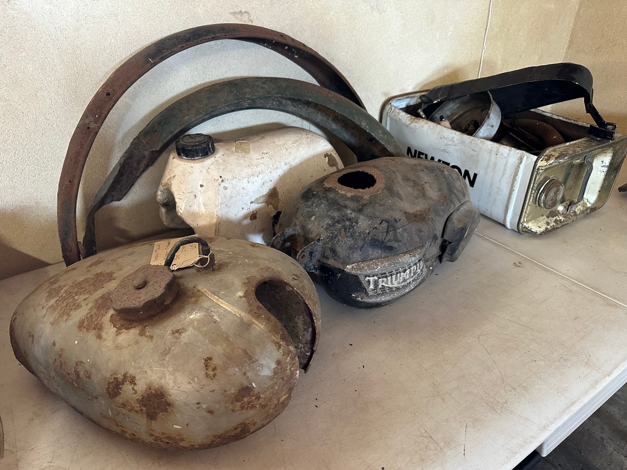 Three old fuel tanks including Triumph, two mudguards and quantity of spare parts etc. - Image 2 of 4