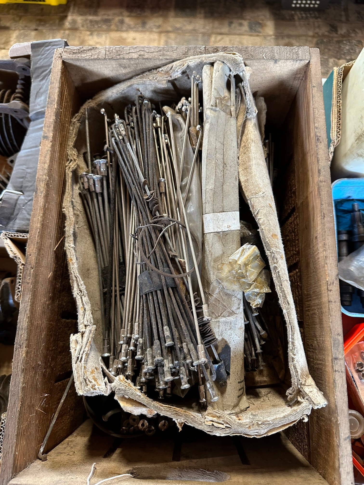 A large quantity of wheel spokes, various sizes, mostly new old stock (one box).