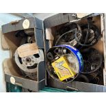 A quantity of mixed electrical spares, magnetos, a flywheel etc. (two boxes).