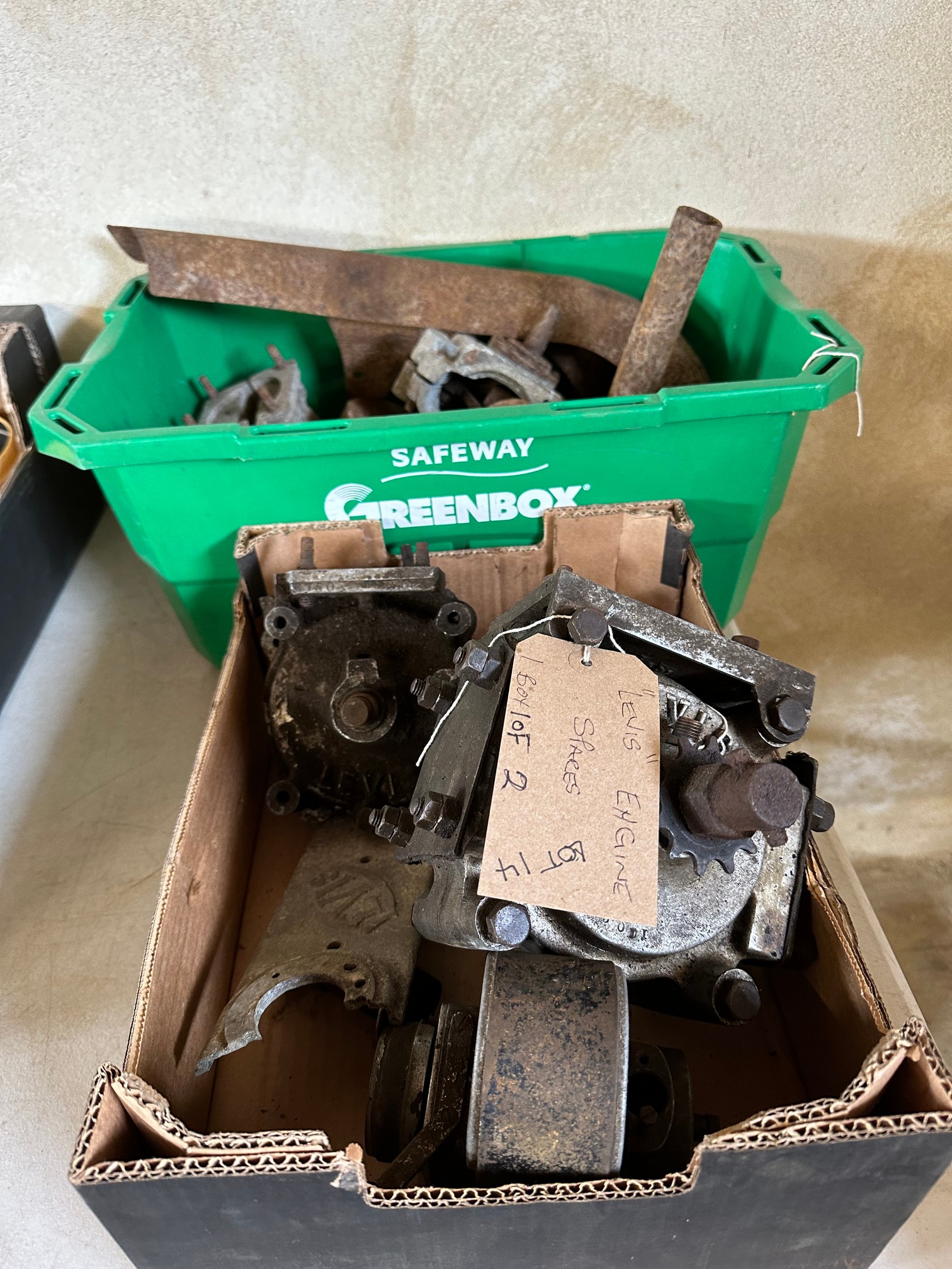 Two boxes of Levis engine spares.