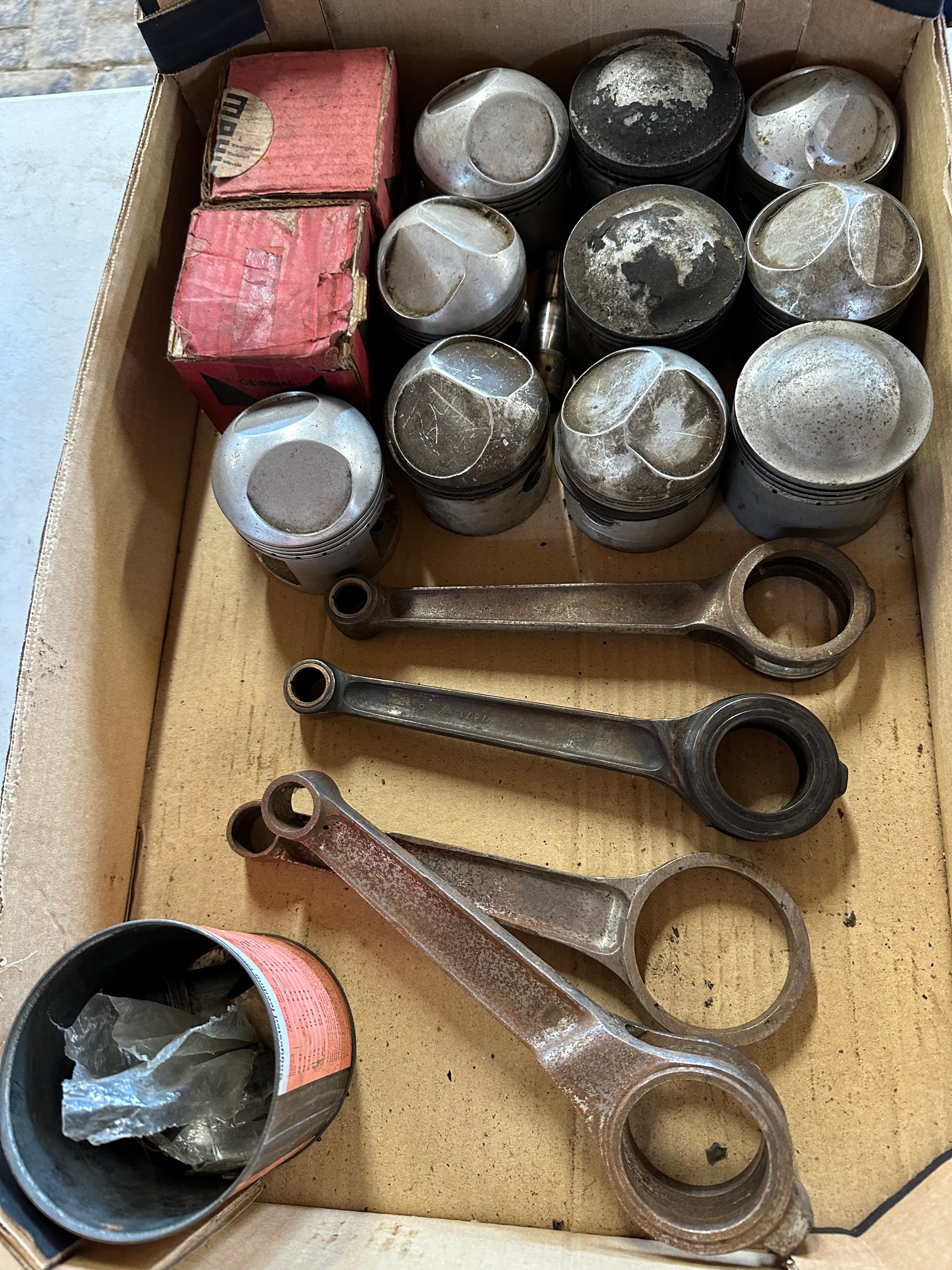 A box of JAP pistons, con-rods etc. (used).
