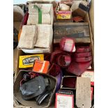 A box of lights, lamp lenses, switches etc. appear new old stock including Lucas, Osram, PMG etc.