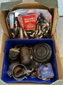 A box of mixed parts including spark plugs, a horn, coils etc.
