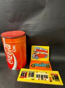 A Coca-Cola tin stool (1994) and three wooden jigsaws (Abbatt Toys, Galt Toys etc).
