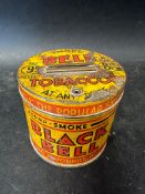 A Bell Tobacco string dispensing tin advertising Black Bell, Red Bell and Blue Bell smoke products.