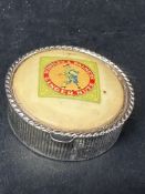 A pill pot with Huntley & Palmers Ginger Nuts advertising to lid.