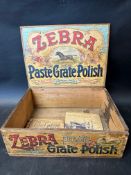 A Zebra Paste Grade Polish counter top display dispensing crate, 15 x 11 x 4 1/2