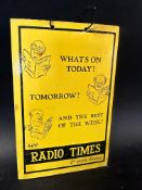 A hanging showcard advertising the Radio Times to one side and BBC's The Listener to the other, 6