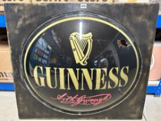 A Guinness single sided plastic sign fashioned into a lightbox, damage to front, 32 3/4 x 28 1/4