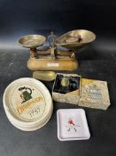 A selection of advertising pieces: a Charrington ashtray, a Guinness miniature tankard and a Johnnie