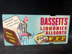 A 1930s colourful tram advertising card for Bassett's Original Liquorice Allsorts with wonderful