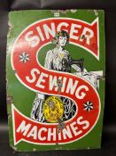 A Singer Sewing Machines enamel advertising sign by Cooper Bond Ltd. London SE16, 24 x 36