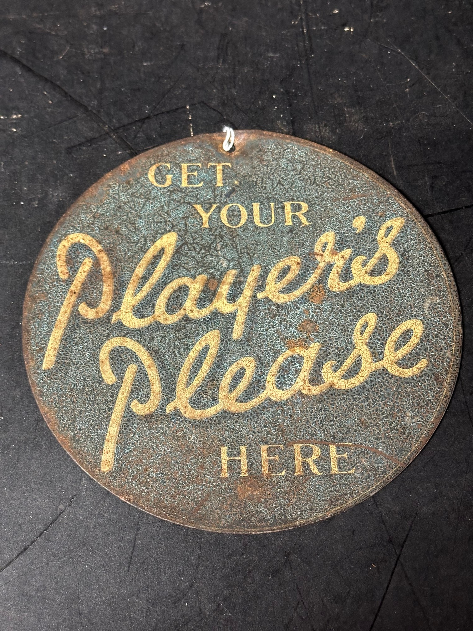 A Player's Please circular advertising sign, 7" diameter.
