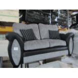 2 seater grey and black sofa, unchekced but looks in good condition at a glance