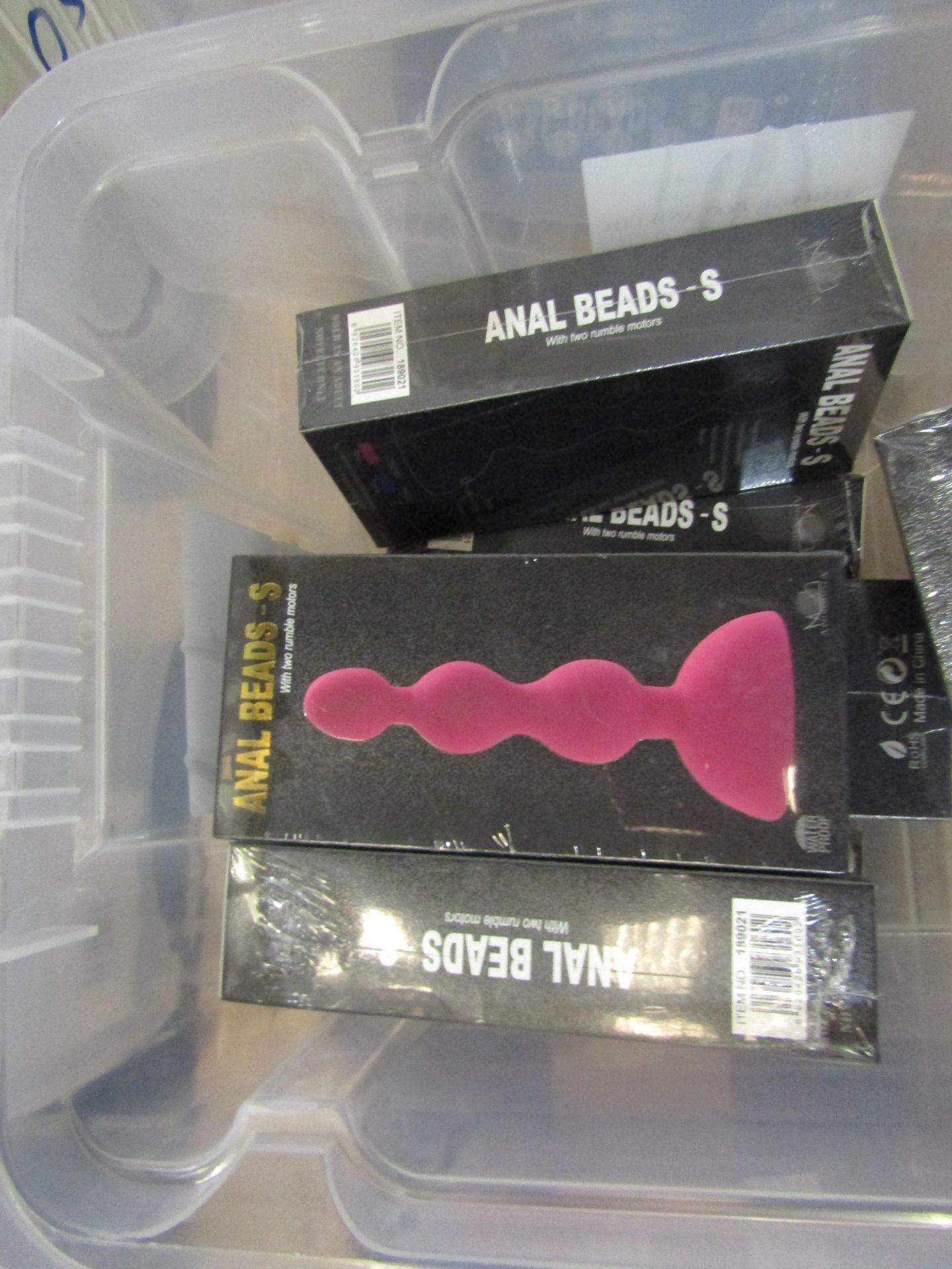 Box Containing 6x Anal Beads With Rumble Motors - All New. 1x Remote Control Anal Plug With