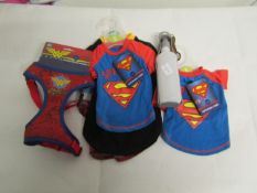 6 X Dog Items Being 1 X Foldable Water Bottle 4 X Dog T/Shirts & 1 X Wonderwoman Harness All Looks